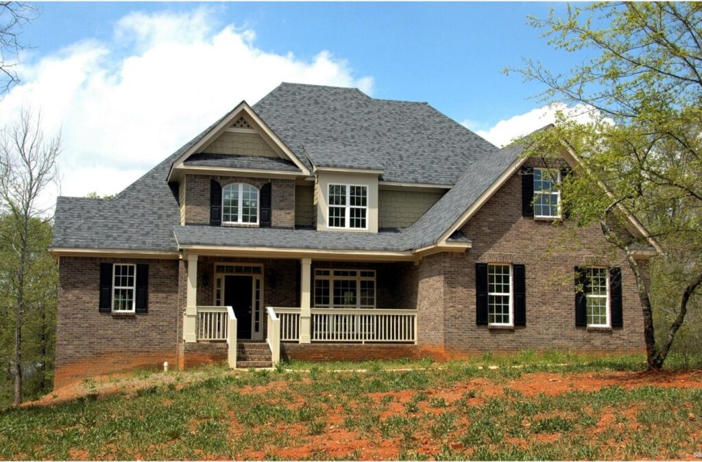 A Strive Roofing & Construction employee providing expert residential roofing services in Spring, TX, showcasing professional tools and skills to ensure top-quality results.