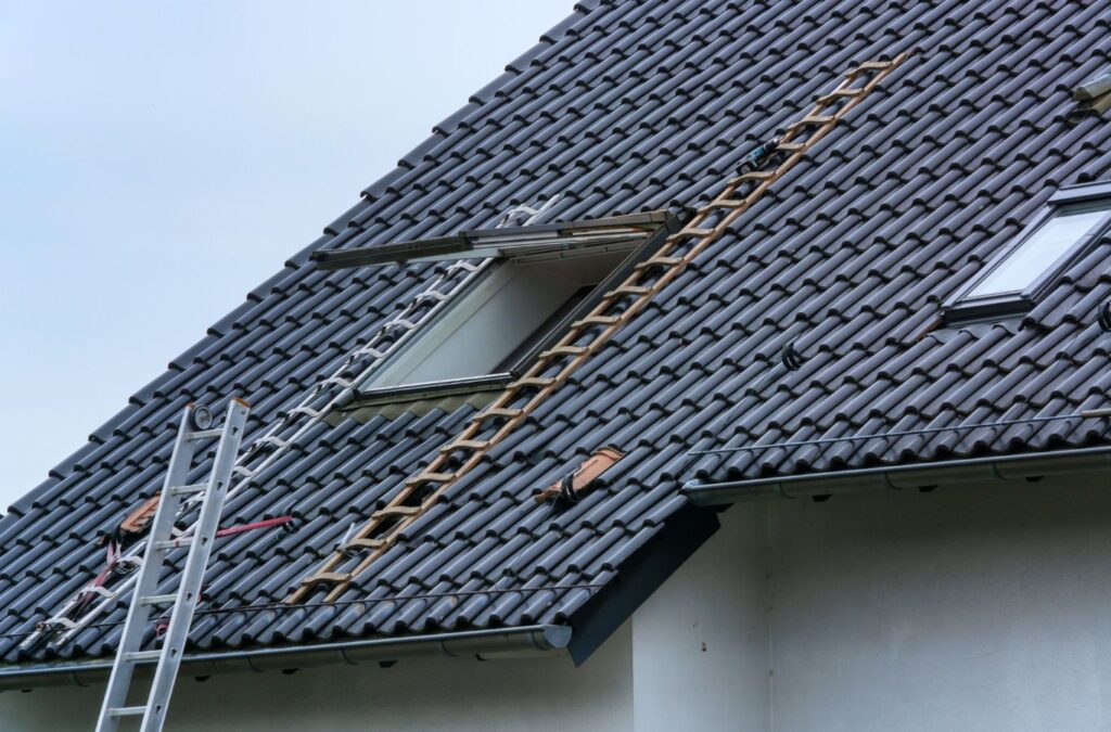 A Strive Roofing & Construction expert providing commercial roofing in Porter, TX, showing why we are the best choice. Commercial Roofing near me.