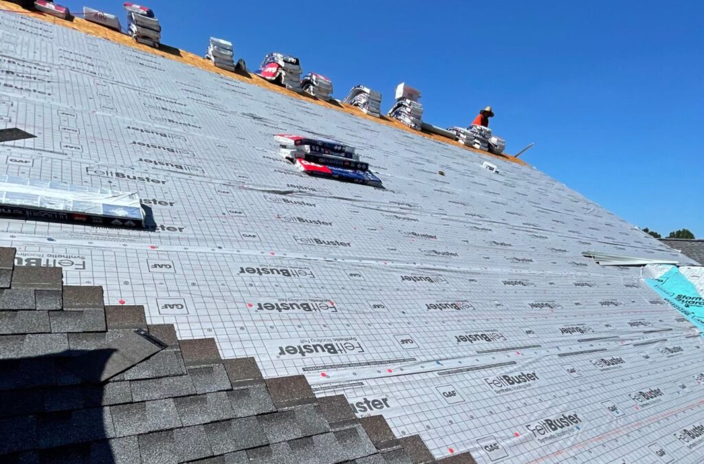 A Strive Roofing & Construction expert providing residential roofing in Spring, TX, showing why we are the best choice. Residential Roofing near me.