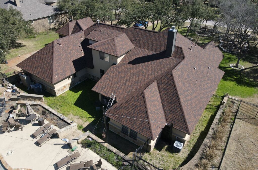 Strive Roofing & Construction roofer installing residential roofing in Spring, TX using quality tools for strong results