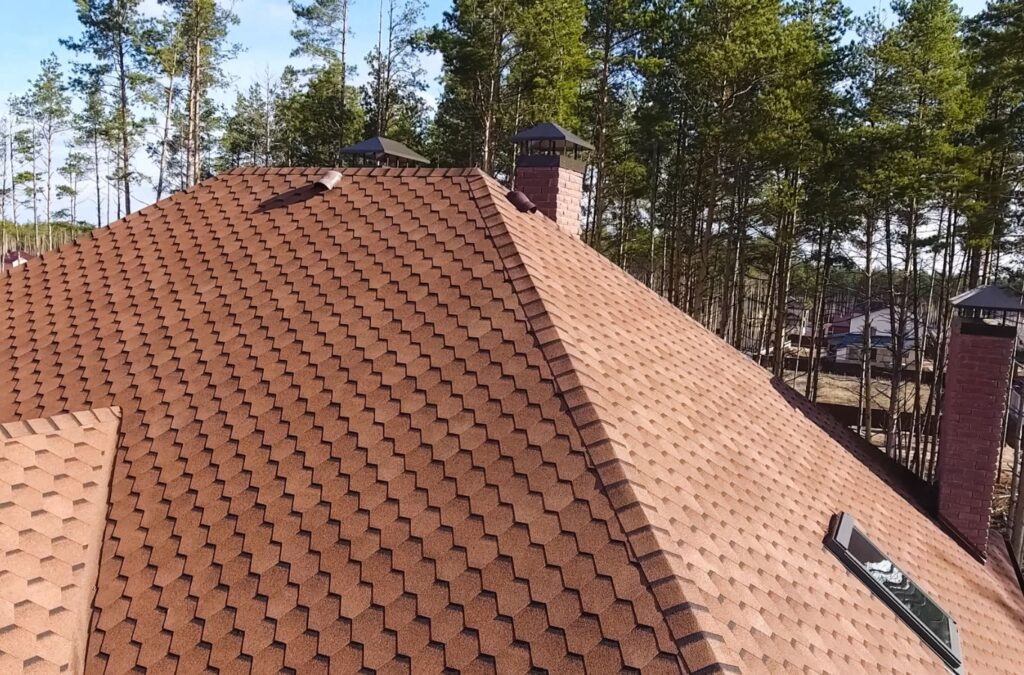 Strive Roofing & Construction technician cleaning roof in Spring, TX using safe equipment for spotless results