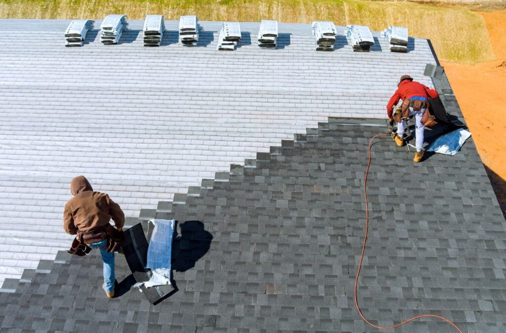 Strive Roofing & Construction crew installing roof in Spring, TX using advanced tools for durable and precise results